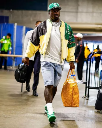 Kapital Yellow Jamaica Beautiful Pillow Bomber Jacket worn by Brandon Aiyuk on the Instagram account @blitzfits