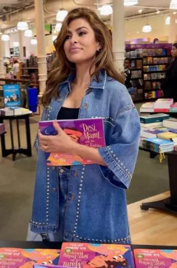 Stella McCartney Studded Short-Sleeve Denim Shirt worn by Eva Mendes on her Instagram Post on September 18, 2024