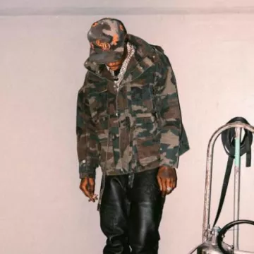 Chrome Hearts Green Camo & Orange Cross Patches CH Hat worn by A Boogie wit da Hoodie on the Instagram account @aboogievsartist