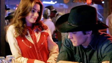 Brokeback Mountain Movie Wardrobe: Anne Hathaway wears Scully Western Floral Yellow and Red Shirt to portray Lureen Newsome