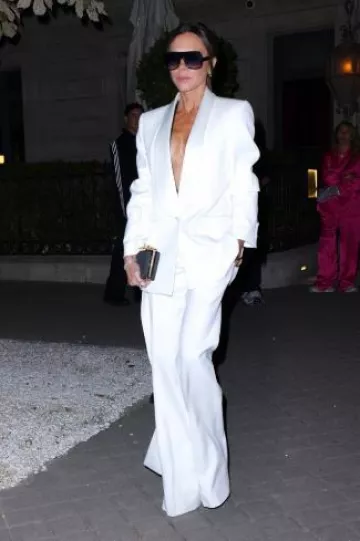 Victoria Beckham New Gigi Low-Rise Straight-Leg Trousers worn by Victoria Beckham at Out & About in Paris on September 28, 2024