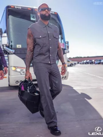 Miu Miu Dark Grey Wool Baggy Jeans worn by Odell Beckham Jr. on the Instagram account @ravens