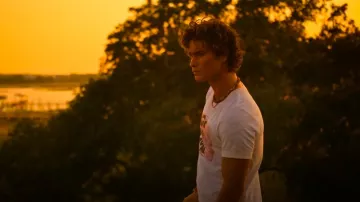 Head High Surf Club Squiggle Worm Necklace worn by John B Routledge (Chase Stokes) as seen in Outer Banks (S04E01)