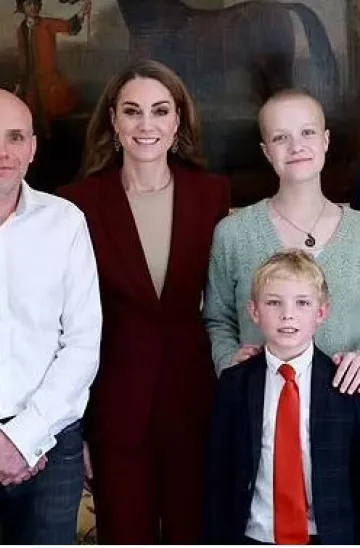 Roland Mouret Axon Wide-Leg Trousers in Maroon worn by Kate Middleton in Windsor Castle on October 2, 2024