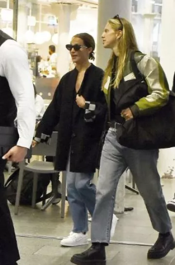 Louis Vuitton Lv Trainer Sneaker worn by Alicia Vikander in London on October 2, 2024