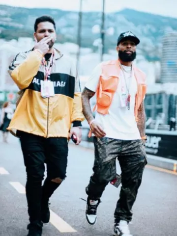 Louis Vuitton Orange Ribbed Utility Vest worn by Odell Beckham Jr. on the Instagram account @obj
