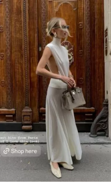 Maxi falda de lana virgen de tiro bajo Alaia usada por Leonie Hanne en su historia de Instagram el 3 de octubre de 2024