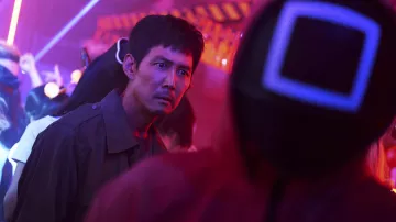 Wardrobe of Squid Game Season 2: Seong Gi-hun (Lee Jung-jae) wears a grey trench coat