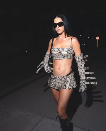 Balenciaga Essex Embossed Boots worn by Katy Perry at Evita Party on August 23, 2024