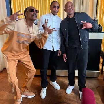 Snoop Dogg wears Gin & Juice Orange Sweatshirt on Instagram