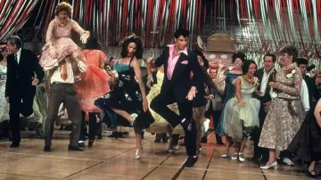 Get the looks of Grease Movie: Cha Cha (Annette Charles) wears Black Halter Neck Dress