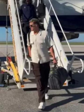 Joe Burrow wears Alo Yoga Espresso Brown Venture Cargo Pants arriving in Cleveland for NFL Game against the Browns on Saturday, October 19, 2024