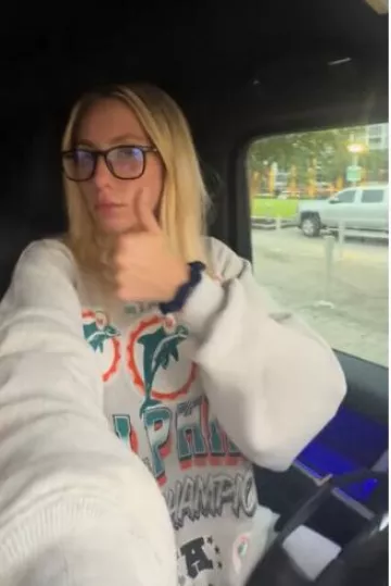 NFL by Abercrombie Miami Dolphins Graphic Crew Sweatshirt worn by Alix Earle on her Tiktok Post on October 7, 2024