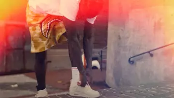 Jordan 4 Retro Metallic Gold worn by Quando Rondo in Quando Rondo - Luh Wodie [Official Music Video]
