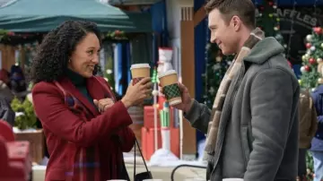Scouting for Christmas Wadrobe: Angela (Tamera Mowry) wears a red coat in the movie