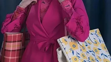 Costumes of Elsbeth TV Series: Elsbeth Tascioni (Carrie Preston) wears Pink Rose Cuffs Coat in season 2, episode 2