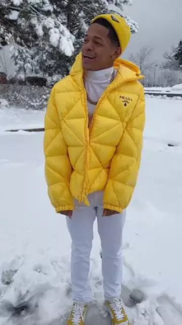Prada White & Yellow Downtown Sneakers worn by YK Osiris on the Instagram account @ykosiris