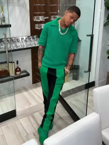 Bottega Veneta Green Triangle Crochet Polo worn by YK Osiris on the Instagram account @ykosiris