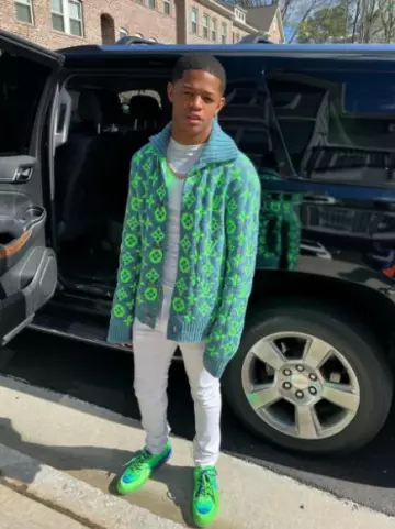 Louis Vuitton Neon Green & Blue Gradient LV Ollie Sneakers worn by YK Osiris on the Instagram account @ykosiris