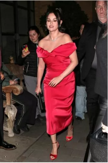 Rachel Gilbert Daria Open-Shoulder Midi Dress worn by Selena Gomez at Screening of Emilia Perez at Ham Yard in London England on October 11, 2024