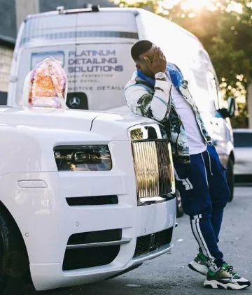 Balmain Palm Tree Print Denim Jacket worn by Yo Gotti on the Instagram account @yogotti1_fans