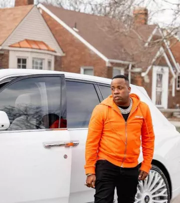 Helmut Lang Orange Basic Zip Hoodie worn by Yo Gotti on the Instagram account @yogotti1_fans