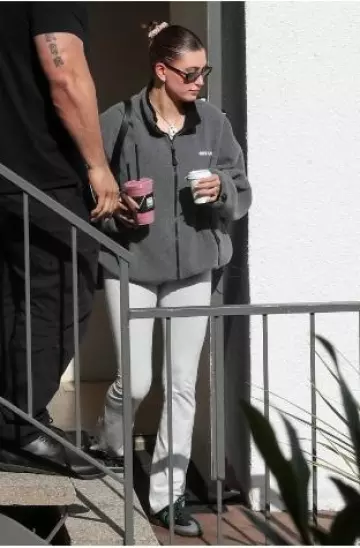 Miu Miu Fleece Sweatshirt worn by Hailey Bieber in West Hollywood on October 12, 2024