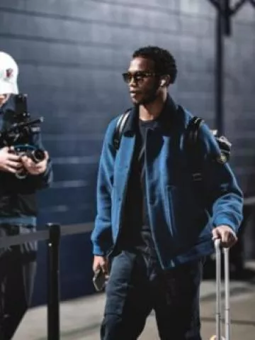 Stone Island Washed Navy Cotton Cargo Pants worn by Garrett Wilson on the Instagram account @nyjets