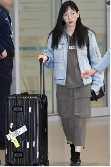 Rimowa Original Trunk Plus worn by Taeyeon at Incheon Airport on October 11, 2024