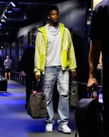 Maison Mihara Yasuhiro Yellow Faded Ripped Pocket Zip Hoodie worn by Tee Higgins on the Instagram account @bengals