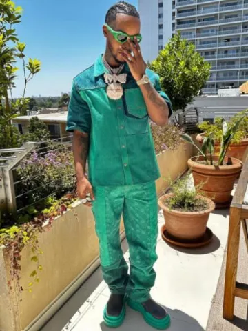 Marine Serre Green Patchwork Moon Print Shirt worn by Toosii on the Instagram account @toosii