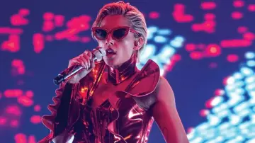 Smile 2 Movie Wardrobe: Skye Riley (Naomi Scott) wears cat eye red sunglasses