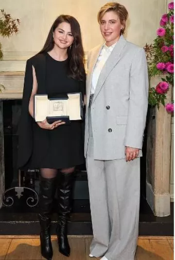 Stuart Weitzman Ultrastuart Stretch Boot worn by Selena Gomez at Cannes Best Actress Award on October 14, 2024