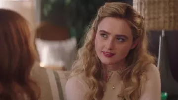 Outfits of Blockers Movie: Julie (Kathryn Newton) wears Club Monaco Light Pink Collar Embroidered Sweater