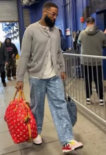 Chanel Blue Allover Patchwork Logos Shoulder Bag worn by Odell Beckham Jr. on the Instagram account @miamidolphins