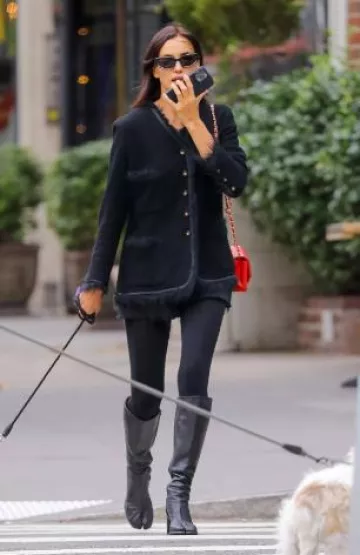 Chanel 10c Cruise Red Lambskin Mini Classic Flap worn by  Irina Shayk in New York City on October 17, 2024