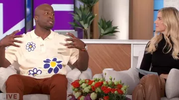 All Good Things Are Welcome Here Butterfly Polo in Cloud Cream worn by Akbar Gbaja-Biamila as seen in The Talk on October 29, 2024
