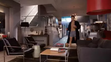 The red Foscarini floor lamp at FDR Foster's (Chris Pine) in the movie Target