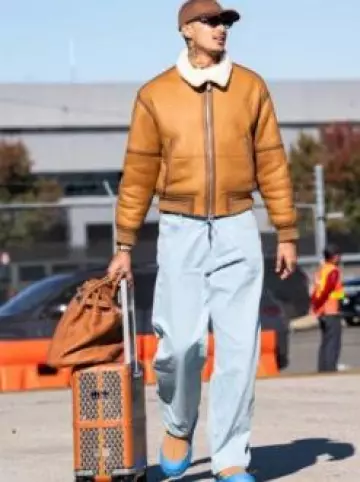 Loro Piana Chestnut Beige Shearling Bomber Jacket worn by Kyle Kuzma on the Instagram account @nbafashionfits