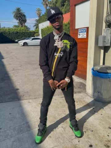 Off White x Babylon III Black Long Sleeve Palm Tree T Shirt worn by Toosii on the Instagram account @toosii