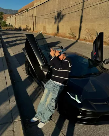 Palm Angels Navy Blue Crochet Stripe Sweater worn by Jess Ortiz-paz on the Instagram account @jesusortizpazfr