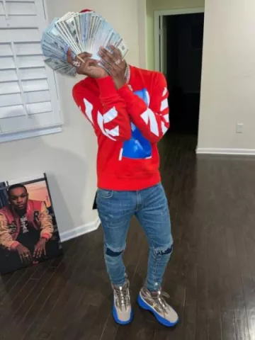 Off White Red Mona Lisa Tape Sweatshirt worn by Toosii on the Instagram account @toosii