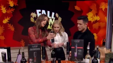 Cinq a Sept Falling Poppies Mesh Turtleneck Top usado por Monica Mangini como se vio en LIVE with Kelly and Mark el 1 de noviembre de 2024