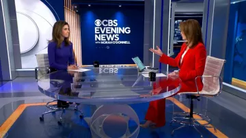 Alexander McQueen Mid-Rise Flared Pants worn by Norah O'Donnell as seen in CBS Evening News on October 28, 2024