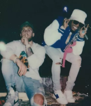 Off White White & Blue Arrow Sneakers worn by Tory Lanez on the Instagram account @torylanez