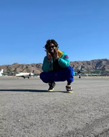 Moncler Turquoise Dervaux Down Jacket worn by Saint Jhn on the Instagram account @saint._.jhn