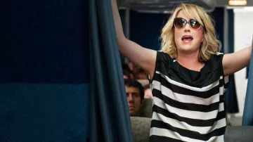 Wardrobe from Bridesmaids: Annie (Kristen Wiig) wears Cat Eye Sunglasses in the movie