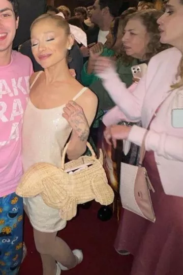 Chanel White Leather Pointy Toe Faux Pearl Pumps worn by Ariana Grande at Wicked Los Angeles Premiere on November 9, 2024