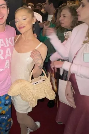 Thom Browne Wicker Hector Basket Bag worn by Ariana Grande at Wicked Los Angeles Premiere on November 9, 2024
