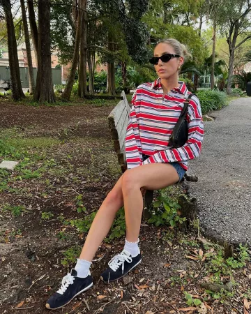 Miu Miu Suede Low Top Sneakers worn by  Alix Earle on her Instagram Post on November 10, 2024